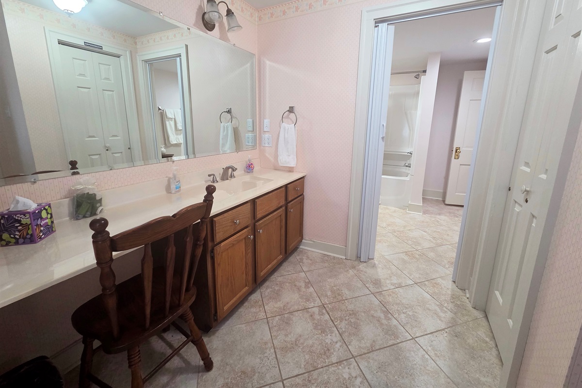 A shared Jack and Jill bathroom upstairs, providing easy access from both bedrooms.