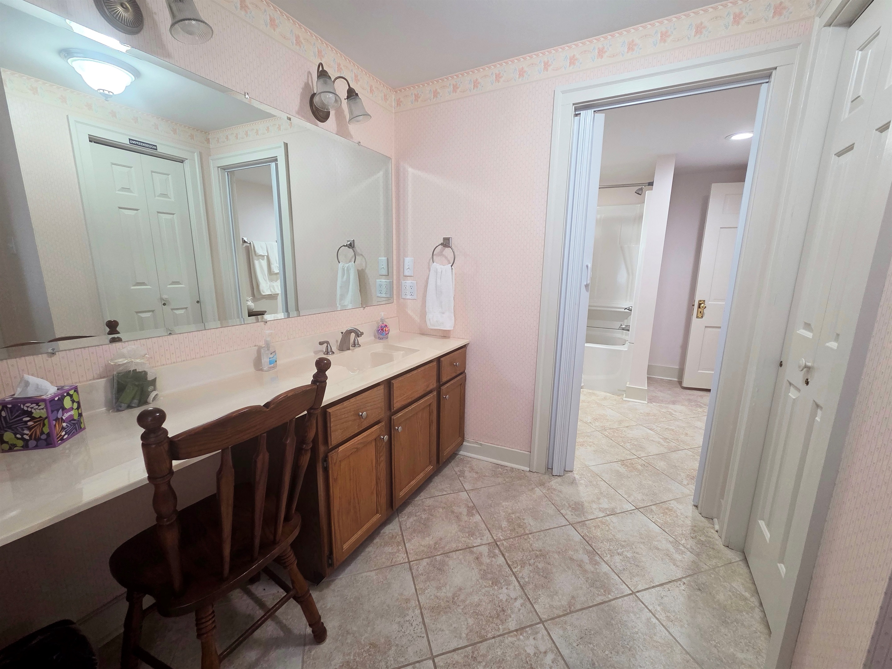 A shared Jack and Jill bathroom upstairs, providing easy access from both bedrooms.