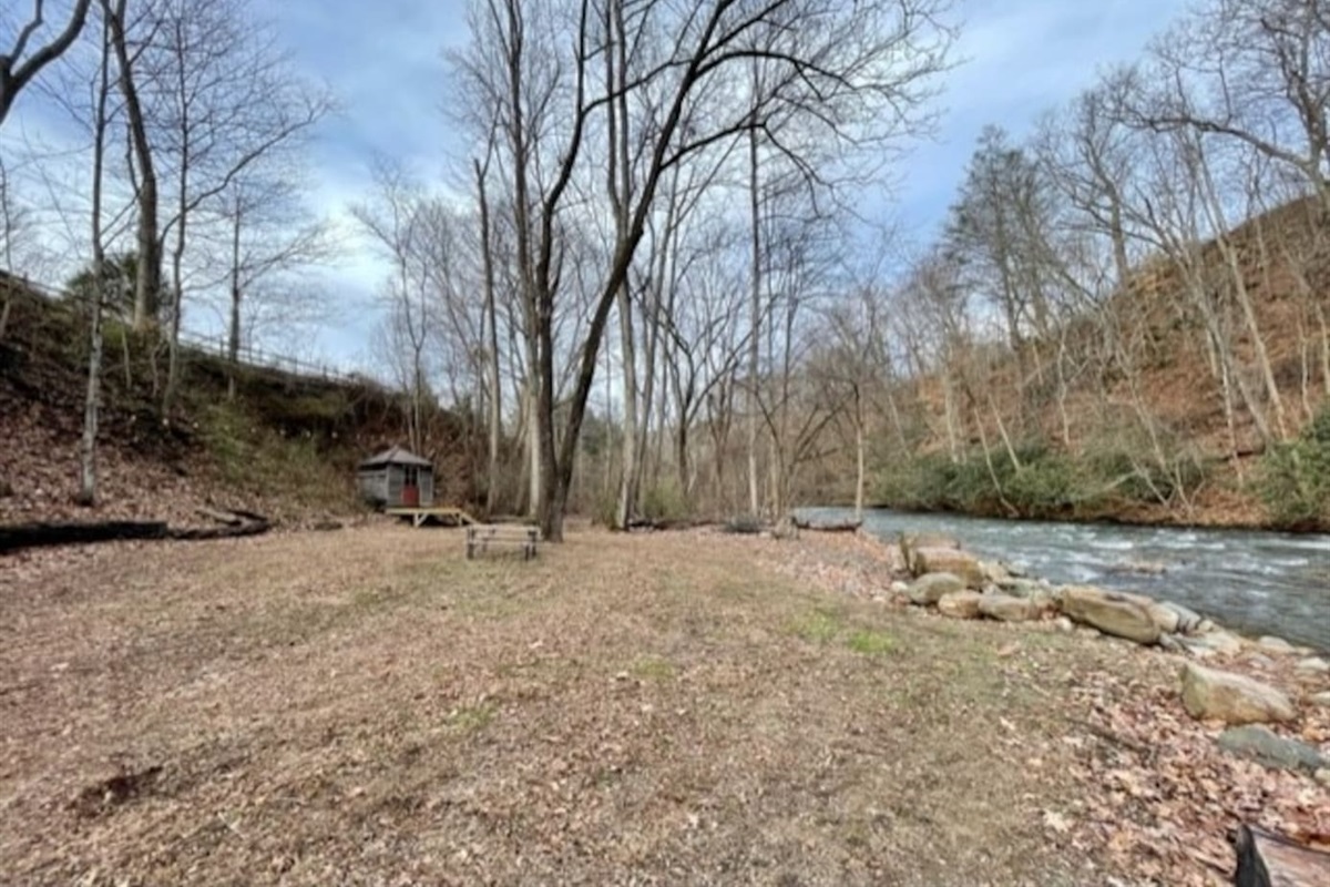 Private oasis by Spring Creek. Imagine a fire in the fire pit, playing yard games, have a picnic...