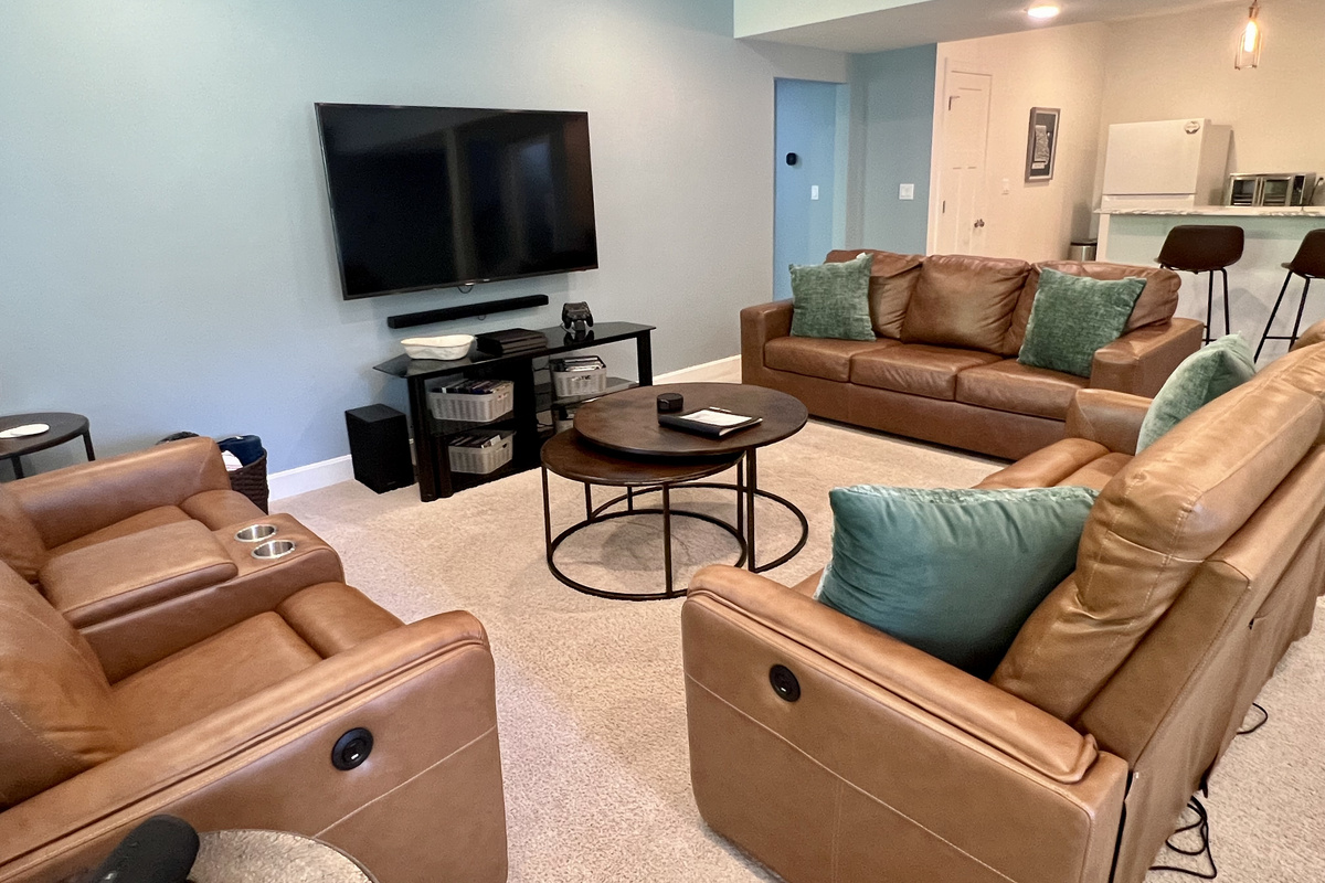 Comfortable seating makes the lower level a great second gathering space.