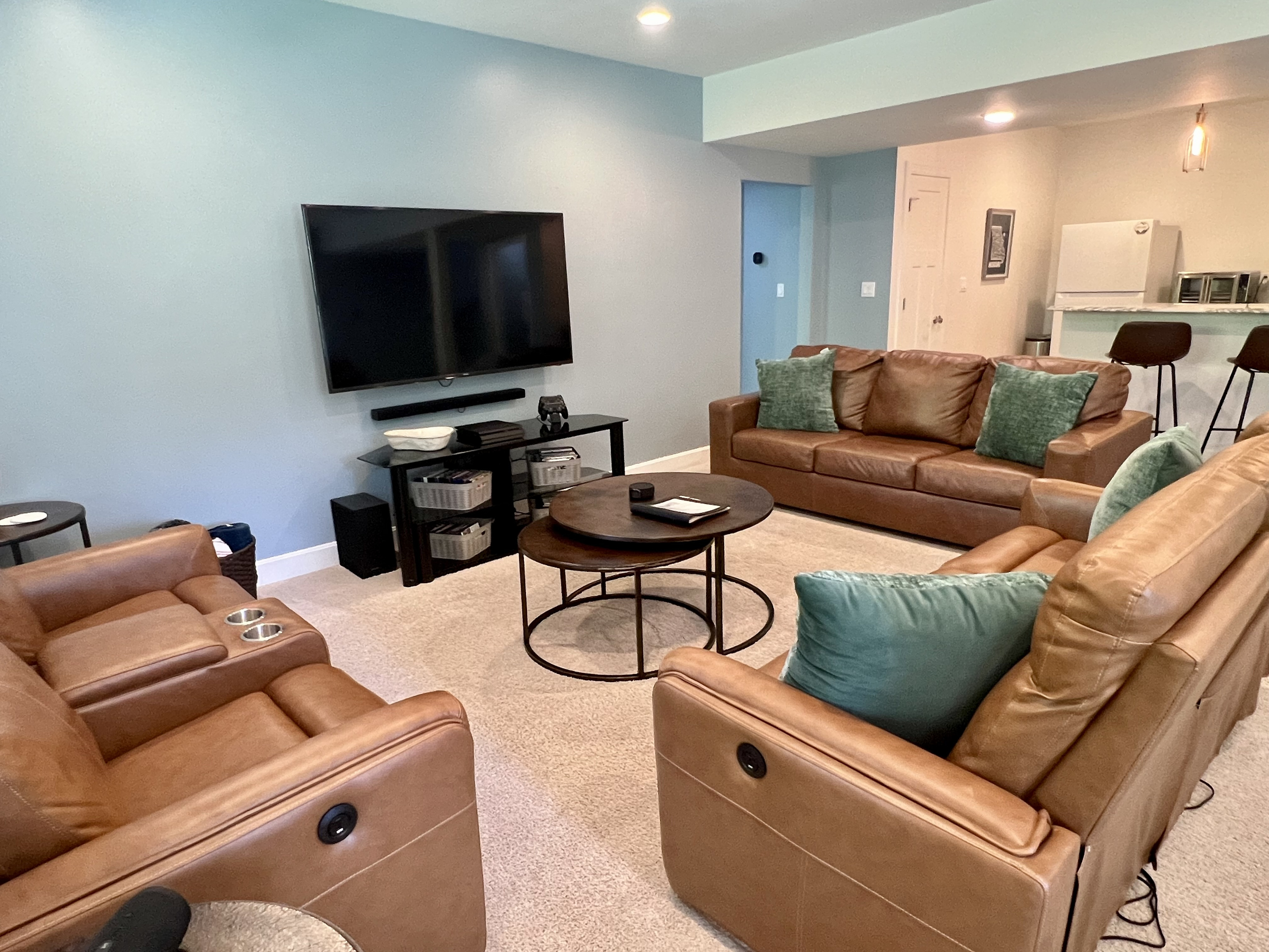 Comfortable seating makes the lower level a great second gathering space.