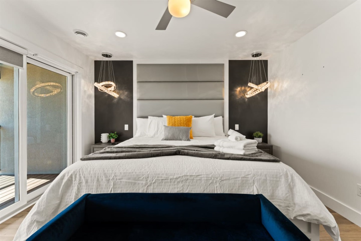 Master bedroom with King bed and private balcony.