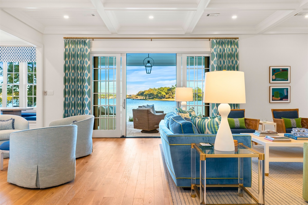 Lounge area opening to patio and outdoor living space.