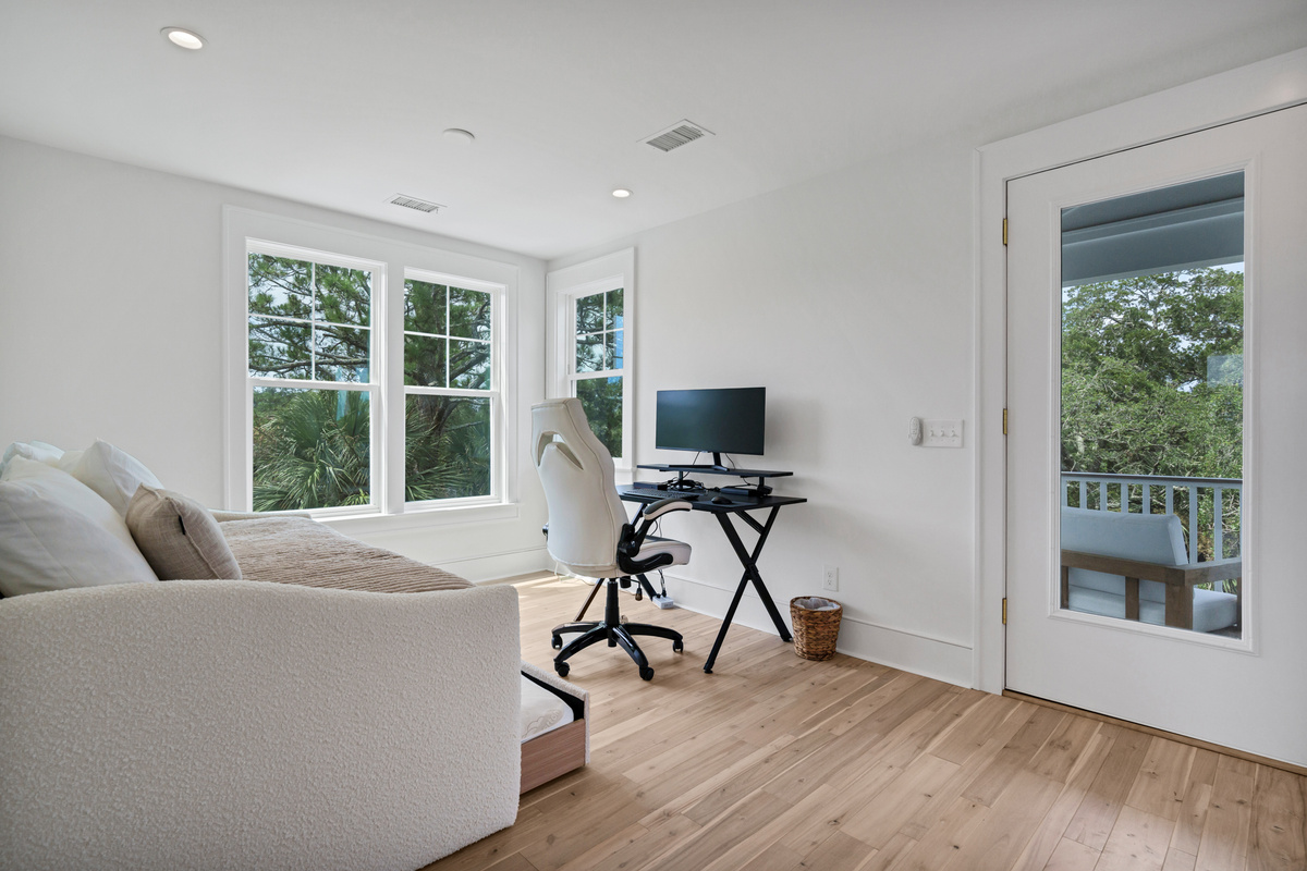 Main Guest Bedroom on Top Floor with Twin over Twin Day Bed and Working Station with office chair, wireless keyboard, mouse and monitor. Entrance to your private deck!