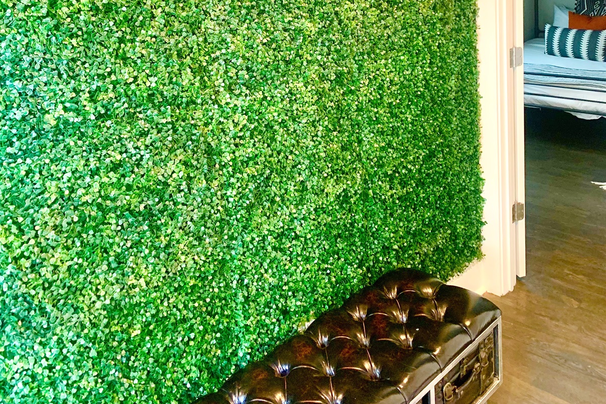 - Vibrant faux boxwood wall makes the perfect welcome statement or selfie backdrop - Paired with a tufted leather bench, ideal for kicking off shoes or snapping a photo - Adds fun personality and a bold design touch near the guest entry or hallway