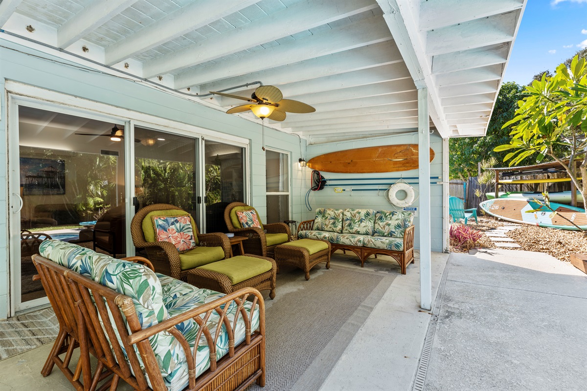 Relaxing outdoor living room area under the covered patio