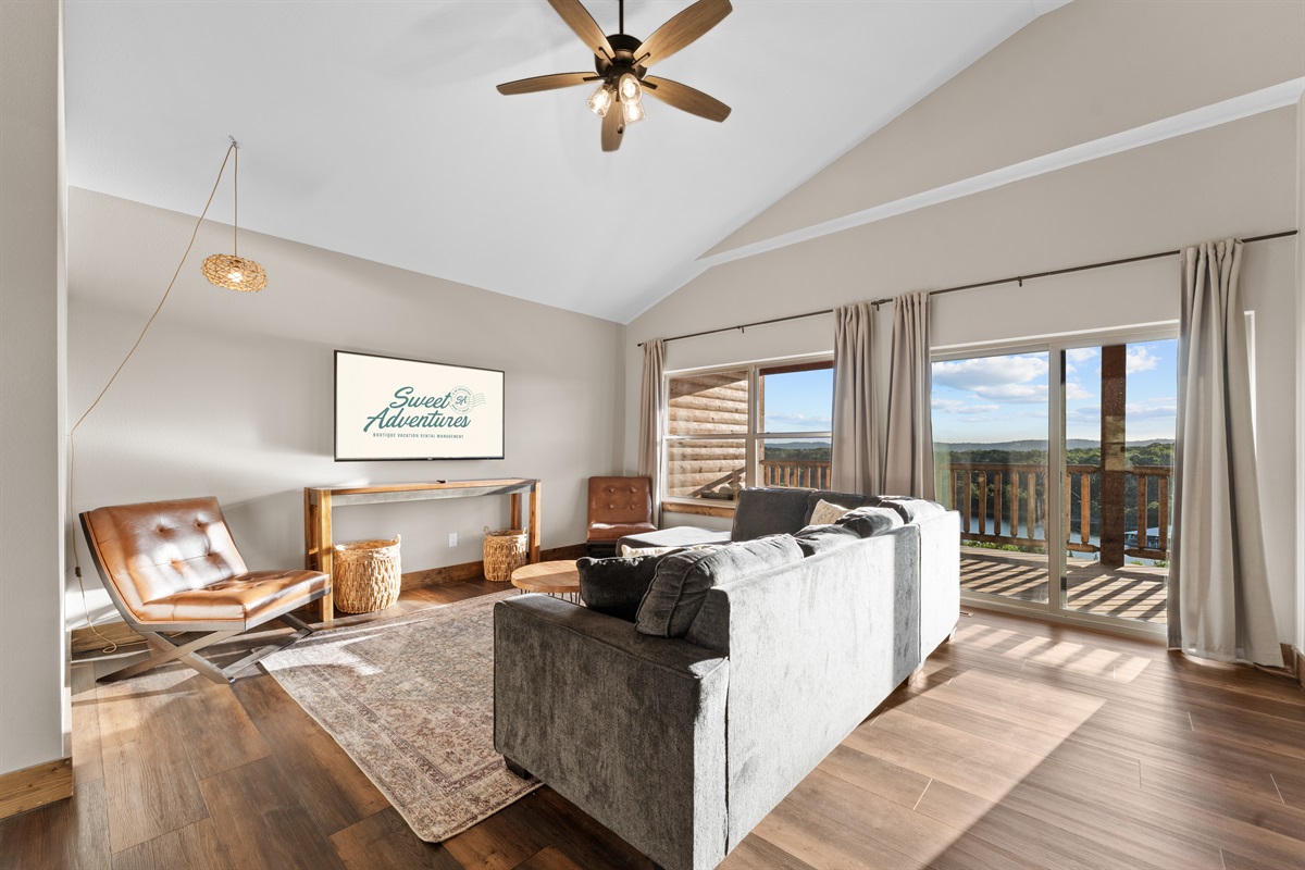 Upstairs loft with vaulted ceilings, smart TV and a private balcony overlooking the lake.