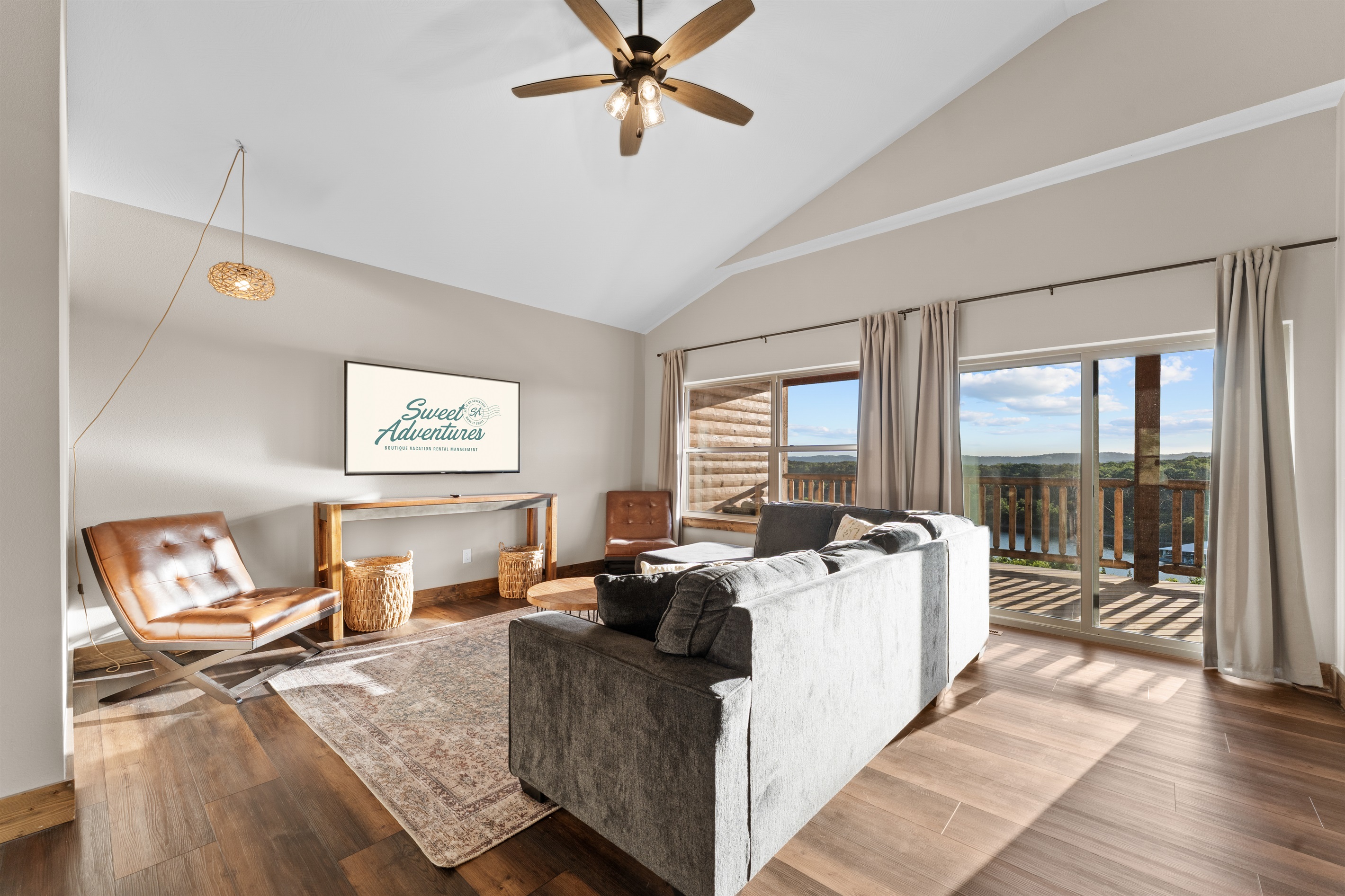 Upstairs loft with vaulted ceilings, smart TV and a private balcony overlooking the lake.