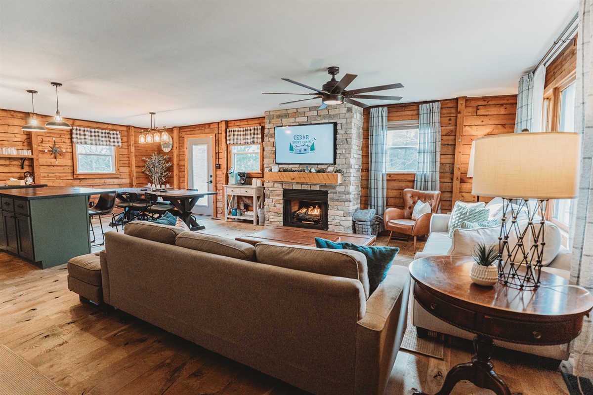 Open Living Room with 55" TV & Kitchen