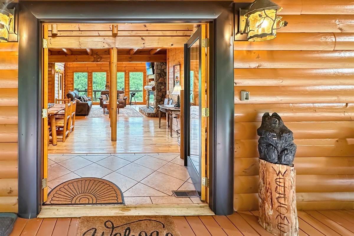 Entryway:Step into nature's embrace with stunning views and warm, inviting decor!