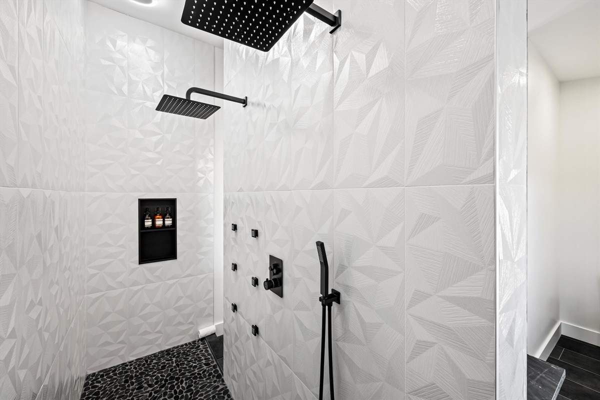 {Master Bath Steam Steam}
A spa-style shower experience — double steam shower heads for the ultimate luxe stay. 