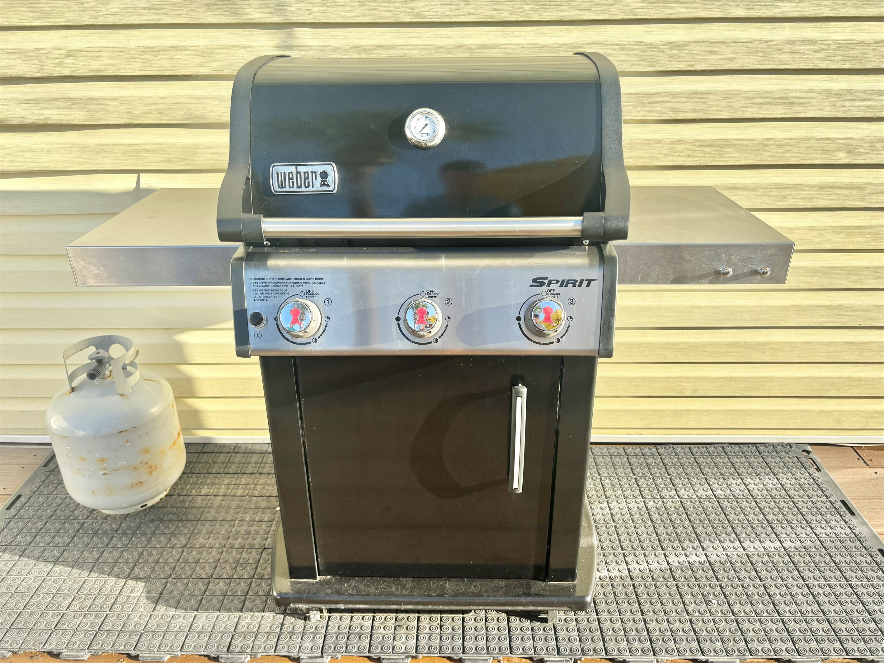 Propane grill on patio