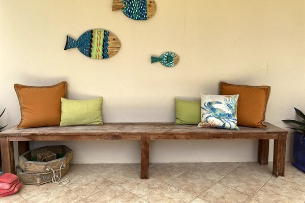 Have a seat! Watch your friends/family play corn hole or giant jenga.