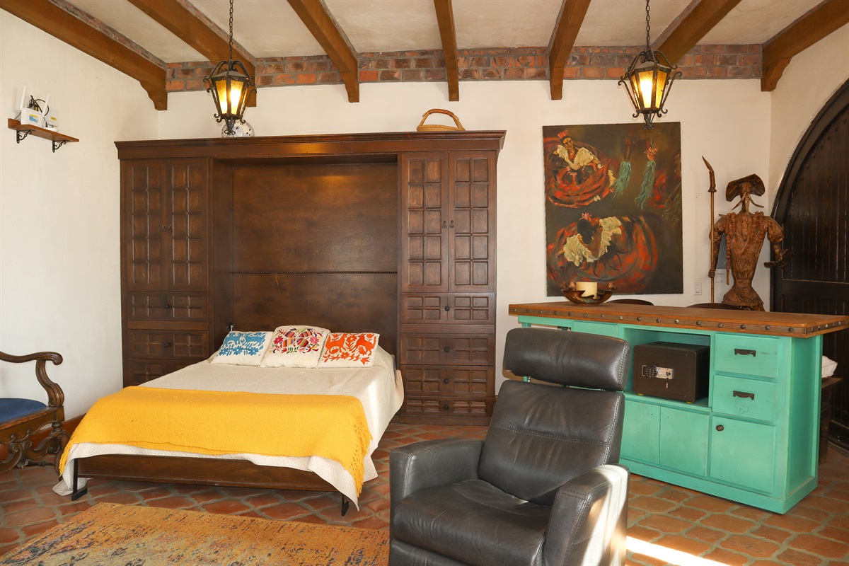 Downstairs Master Bedroom with king-size bed.