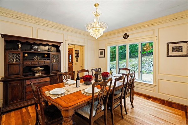 Formal dining room (next to kitchen), with room for 8
