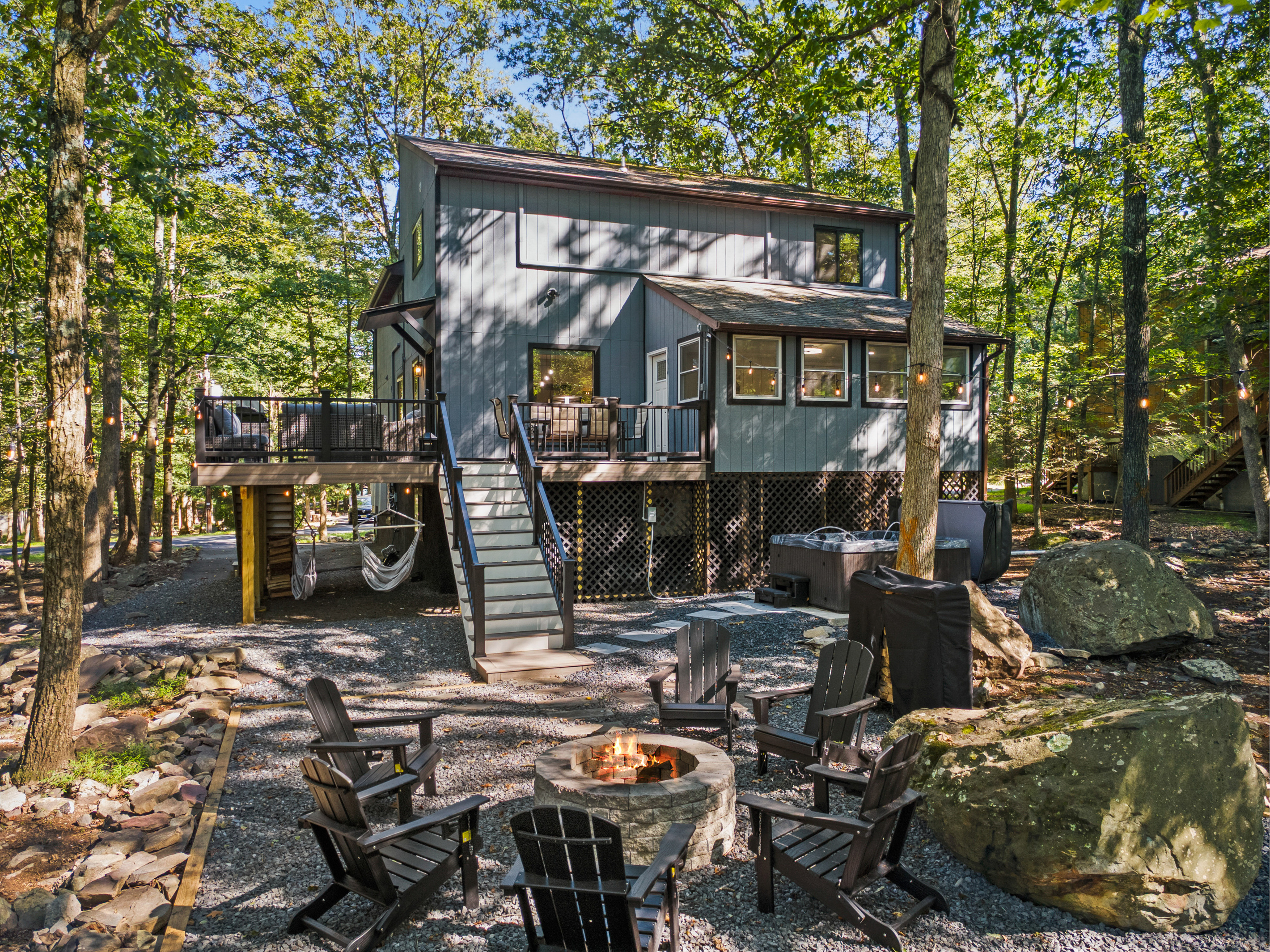 Beautifully laid stone pavers leading down to the private fire pit