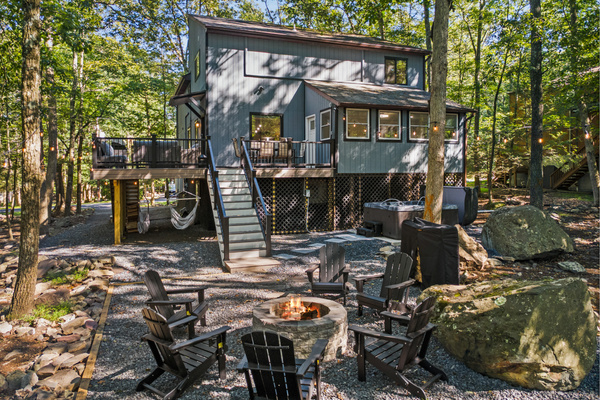 Beautifully laid stone pavers leading down to the private fire pit