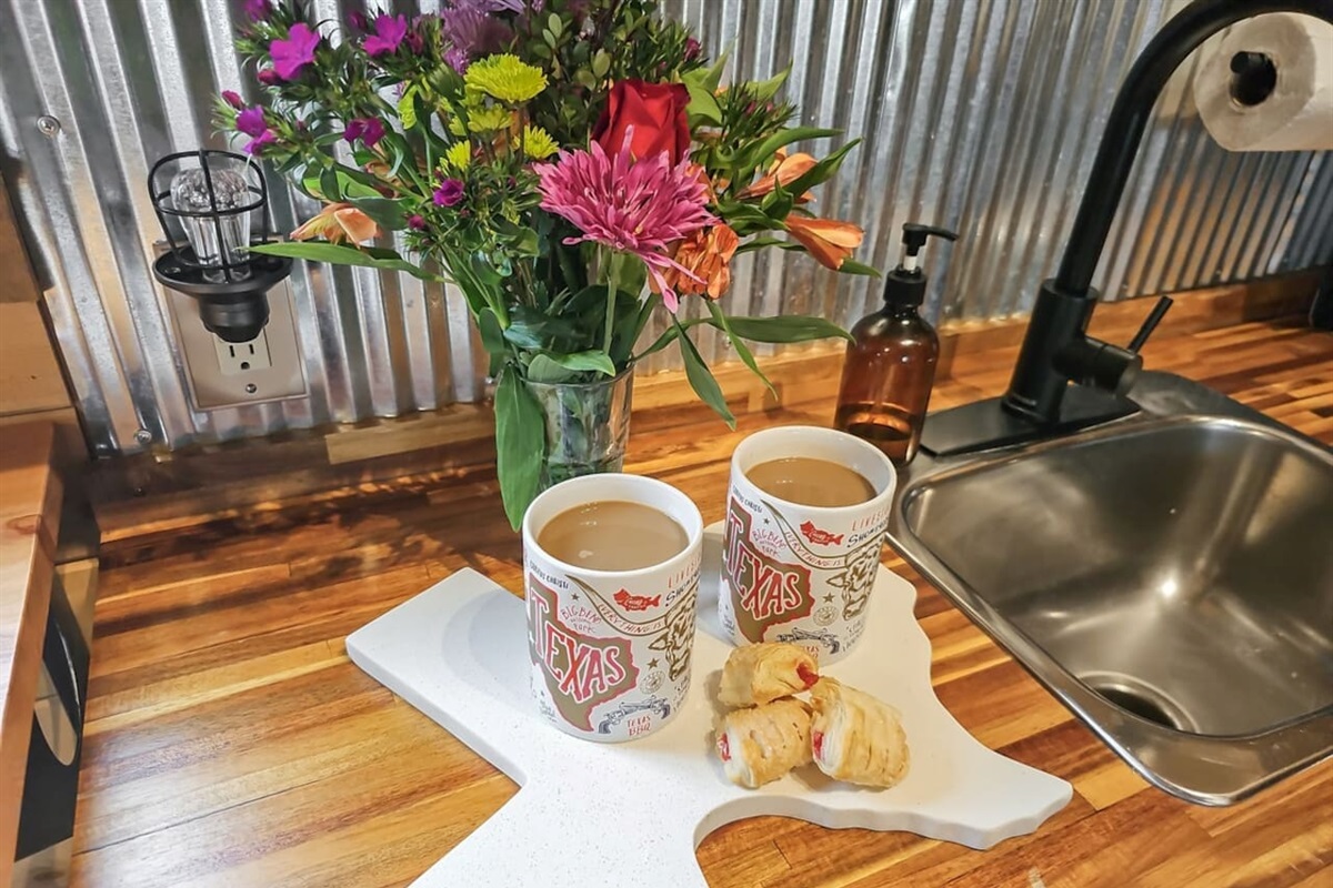 Start your morning the Texas way—fresh coffee and pastries on a rustic countertop, with a view that reminds you you're deep in the heart of the Hill Country.

"…the very memorable Fredericksburg was absolutely amazing." - Pamela, ’21

