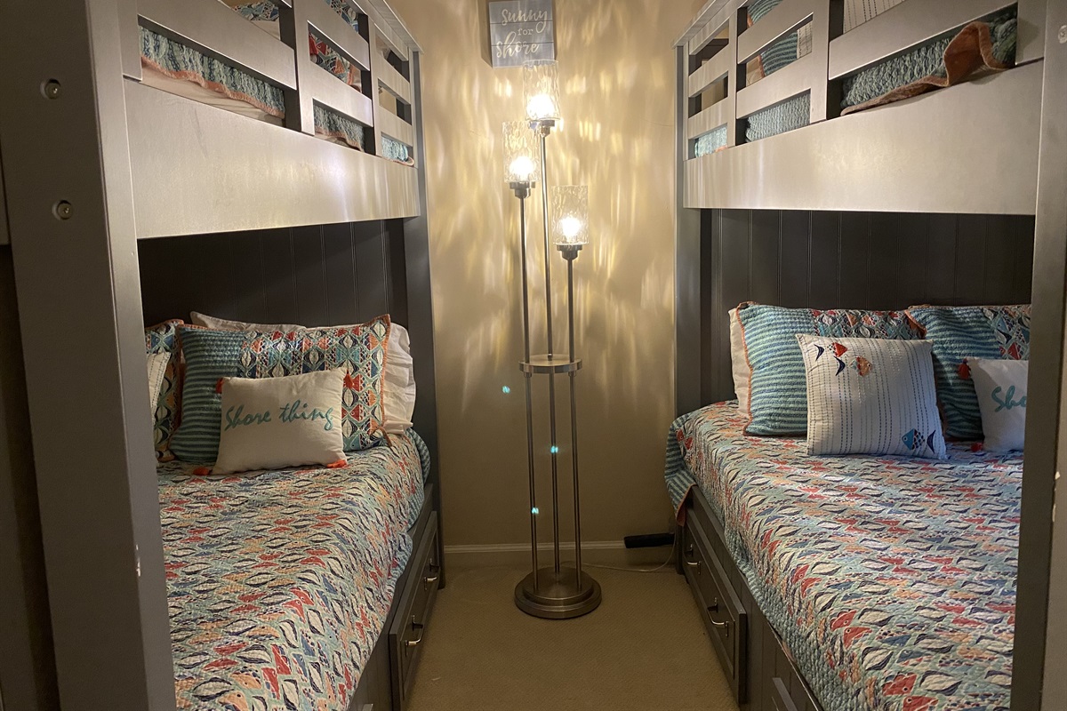 4 double beds in  bunk bedroom