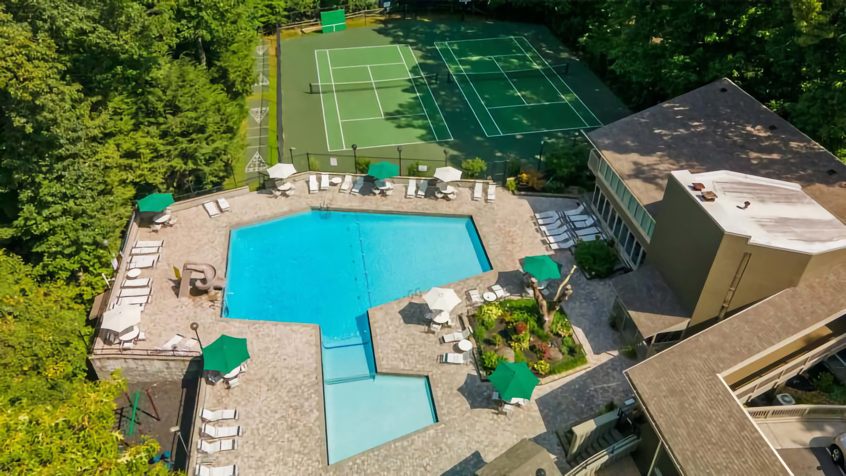 South Baden Clubhouse, pool, and courts.