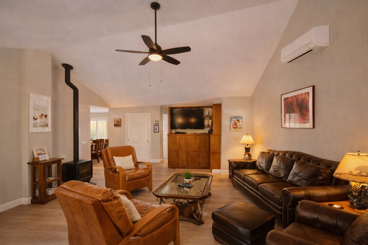 From cozy fireside evenings to cool, comfortable summer days, this space is designed for year-round relaxation.