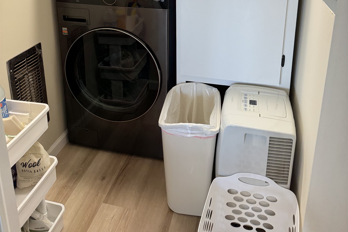 The laundry room was remodeled in 2023 to include a brand new washer & dryer, along with a cabinet that will be locked for cleaners’ use only. You can fold clothes & look at that amazing view! 😂