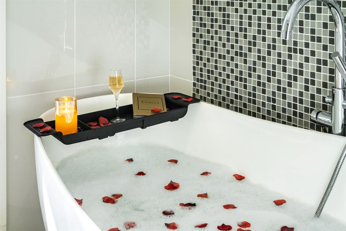 Large bathroom with bath-tube and shower