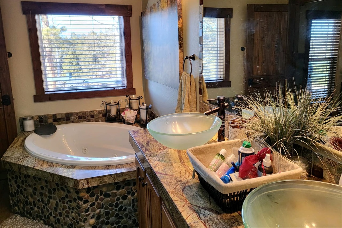 The master bath with garden sized jetted tub and double bowl sinks.