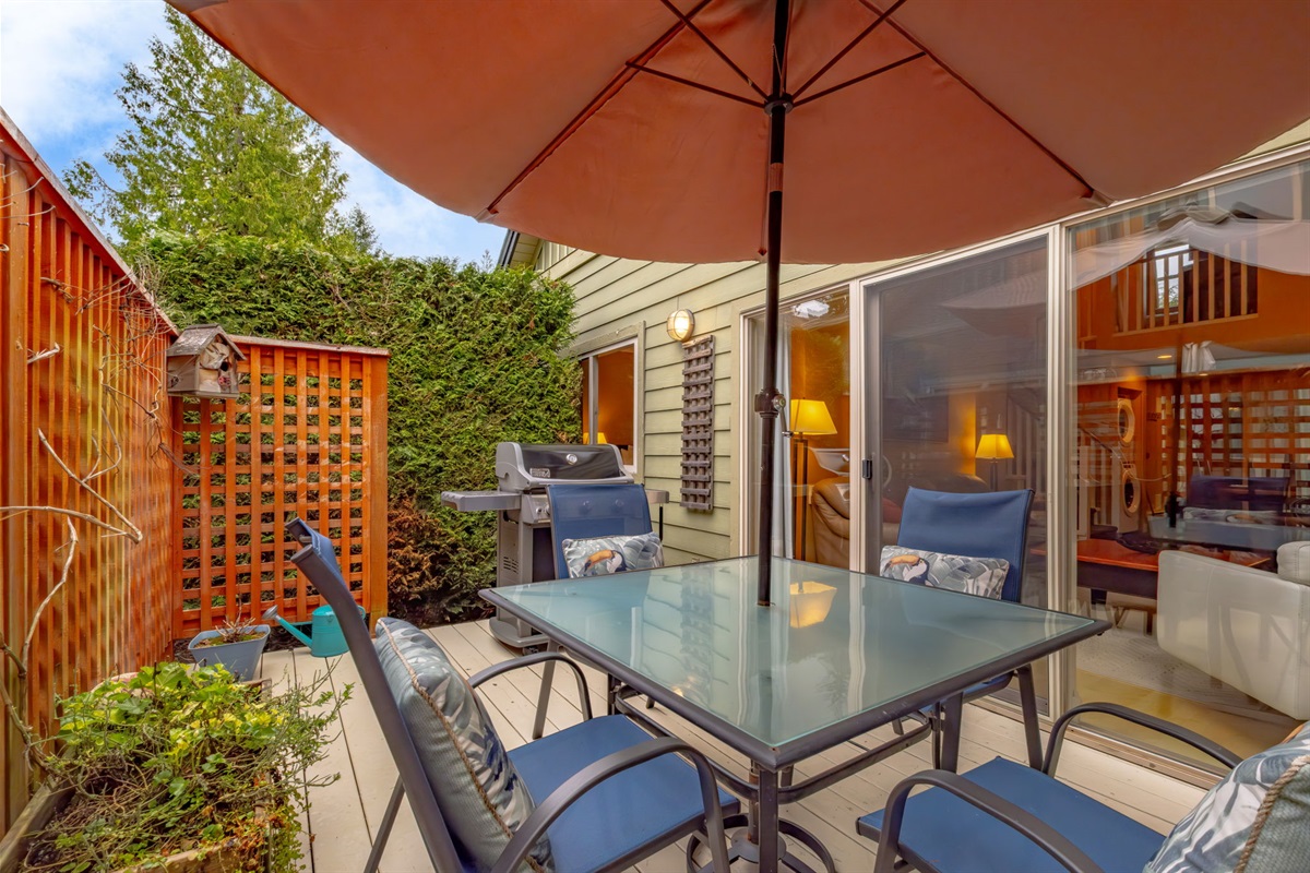Private, semi-enclosed back deck with BBQ.