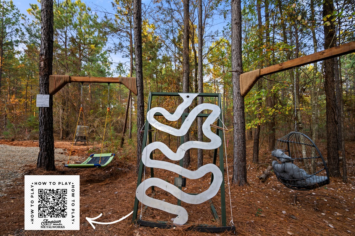 Test your skills on Golfball Racer - a hand and eye coordination game where you move the ball along the silver rail. Scan the QR code for how to play!