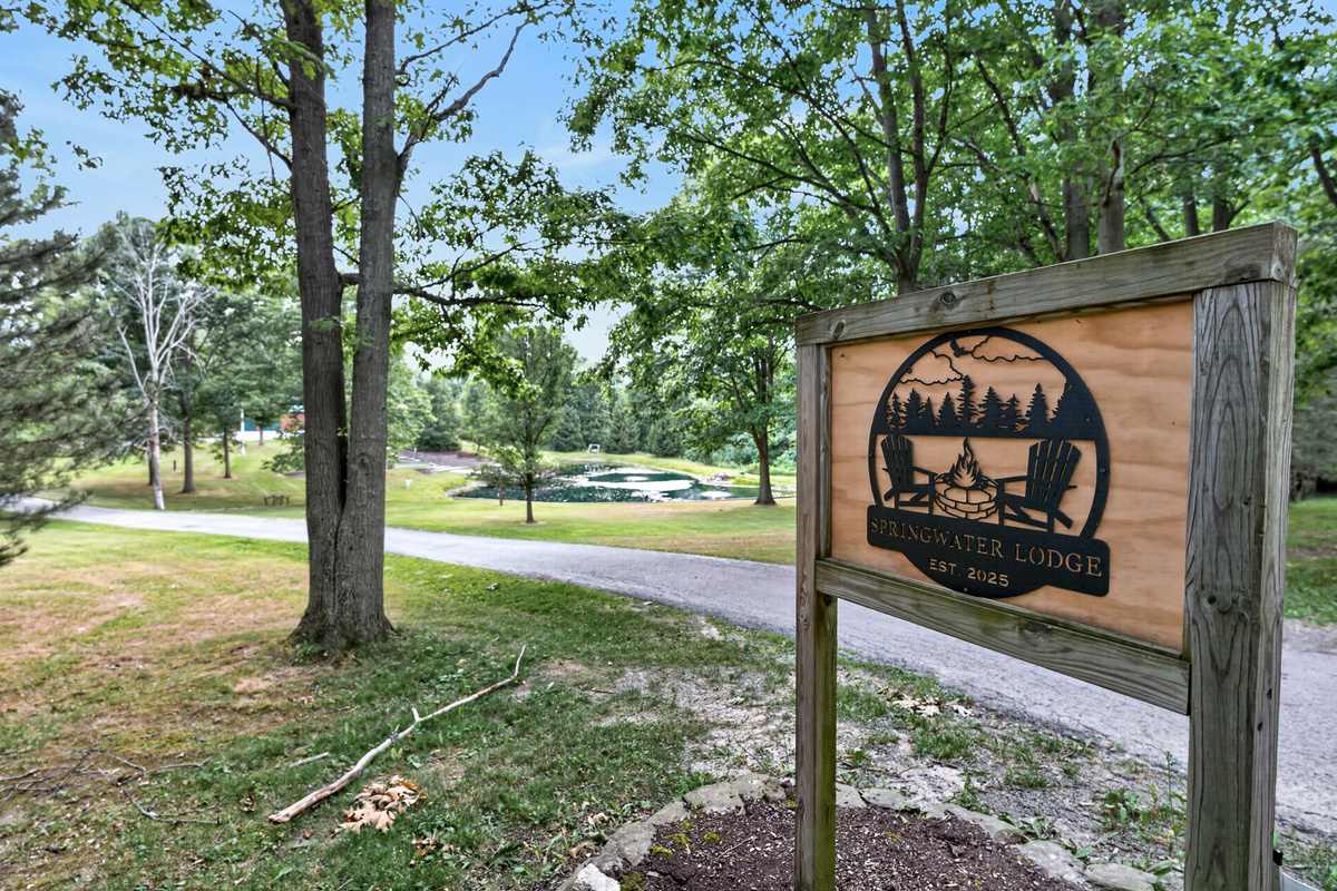 Wooden sign overlooking the yard