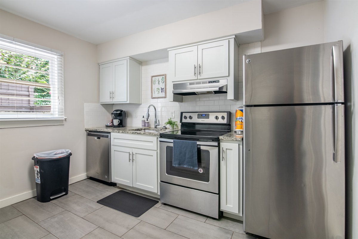 Open kitchen layout with natural light, full-size appliances, and all the basics covered.