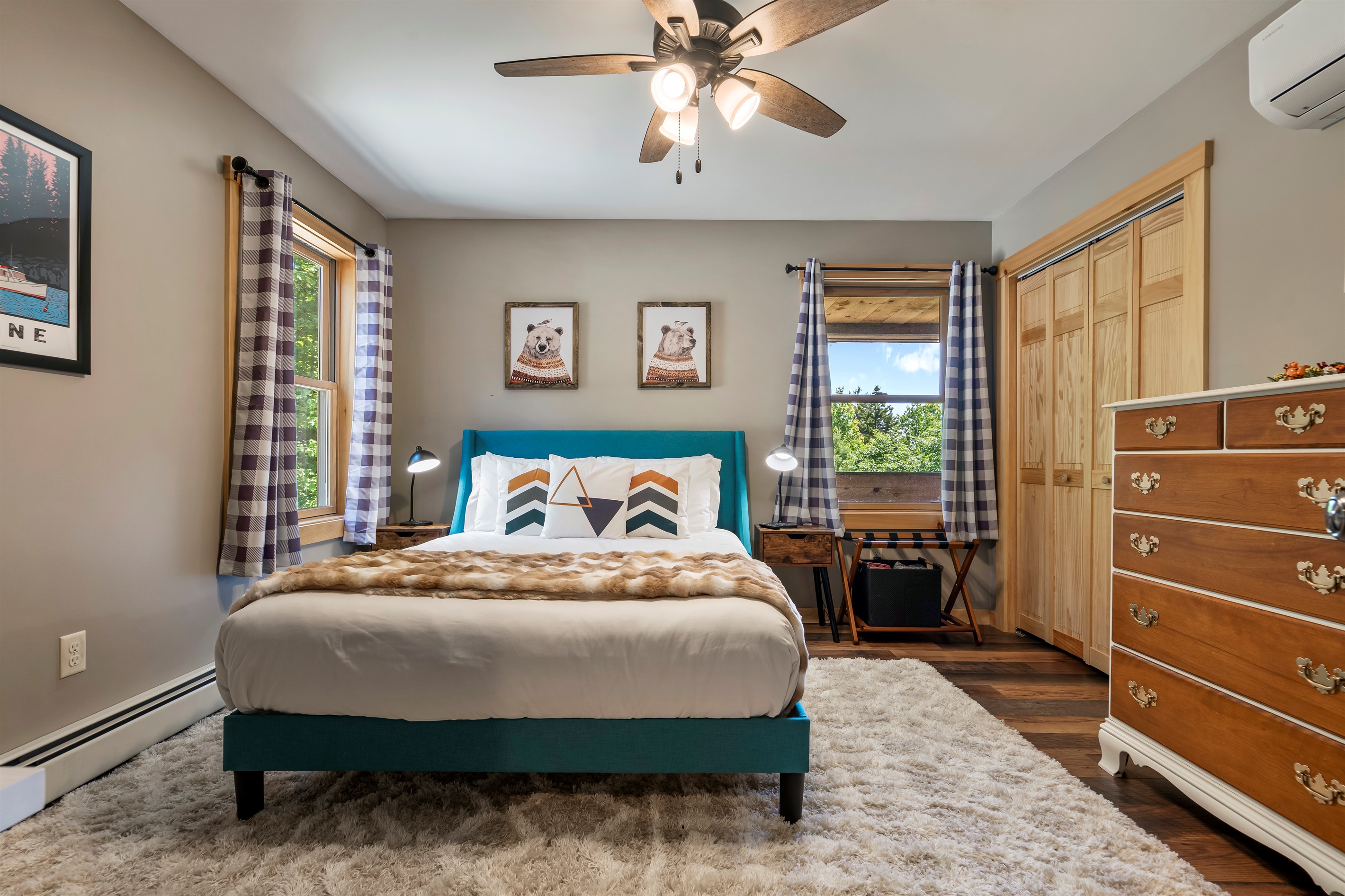 Easily accessible on the main floor, this bedroom includes a comfortable queen-size bed
