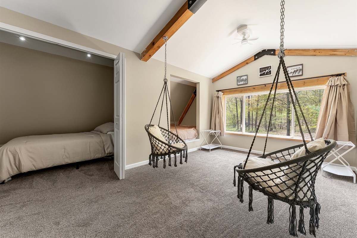 Bedroom #3 with 3 full beds and 1 twin bed.