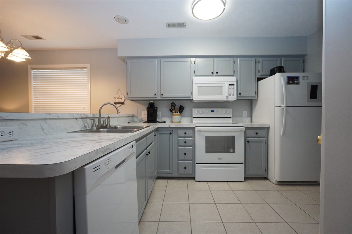 Essential appliances: dishwasher, microwave, oven, stove, fridge, freezer