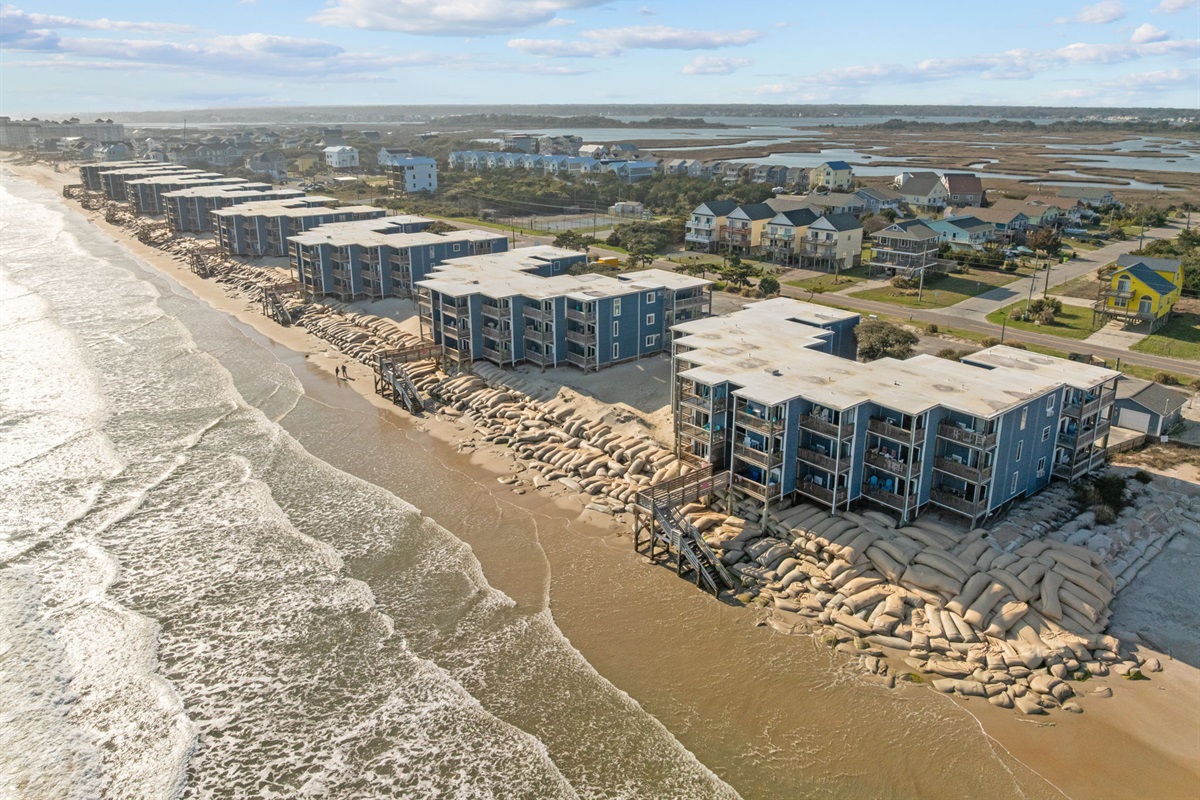 Beautiful aerial perspective of the North Topsail Beach shoreline and Topsail Reef condos, looking south