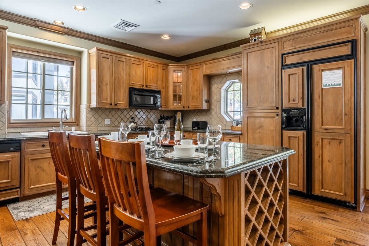 Enjoy quick breakfast or lazy afternoons noshing at the large center island.