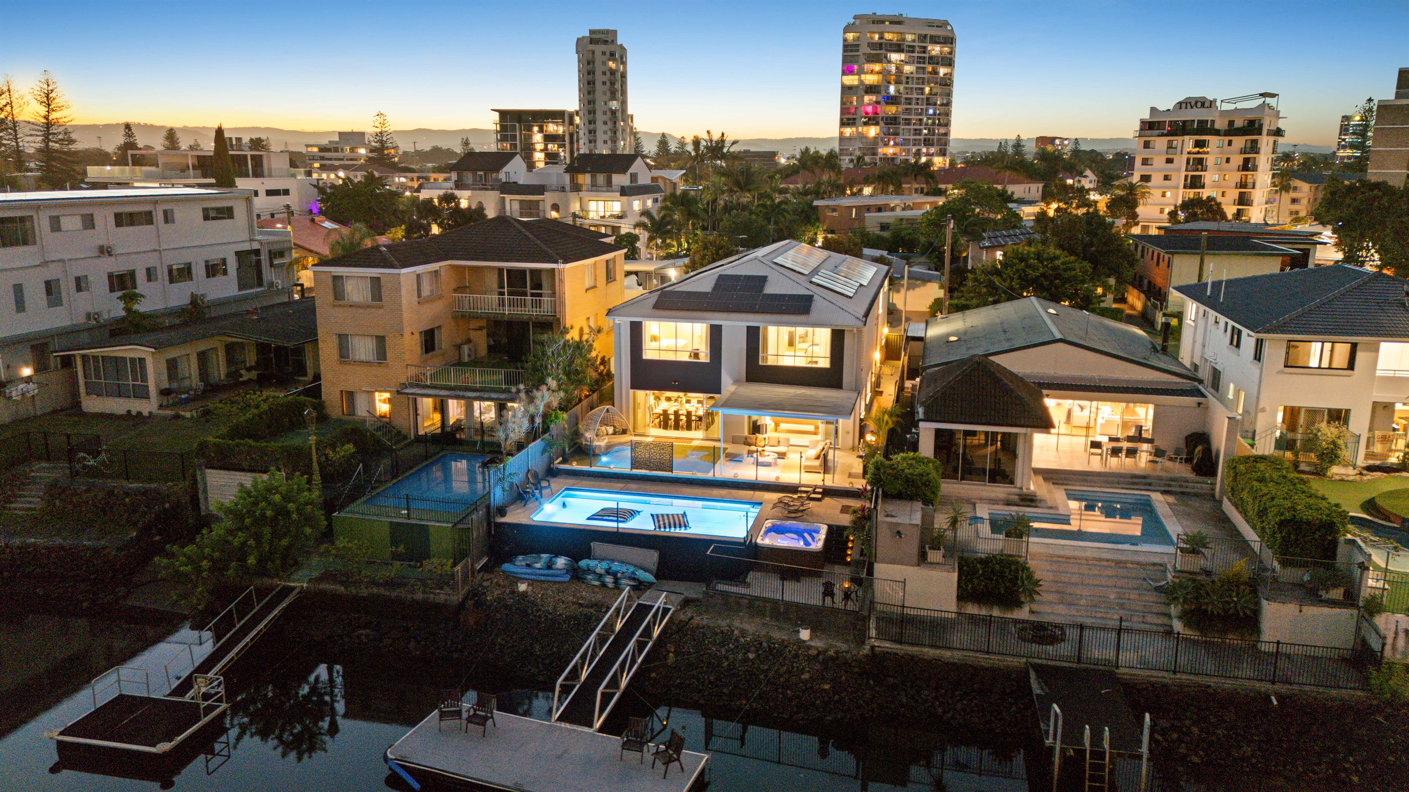 Twilight at Anchorage Waters - where private waterfront living meets City lights.