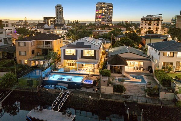 Twilight at Anchorage Waters - where private waterfront living meets City lights.