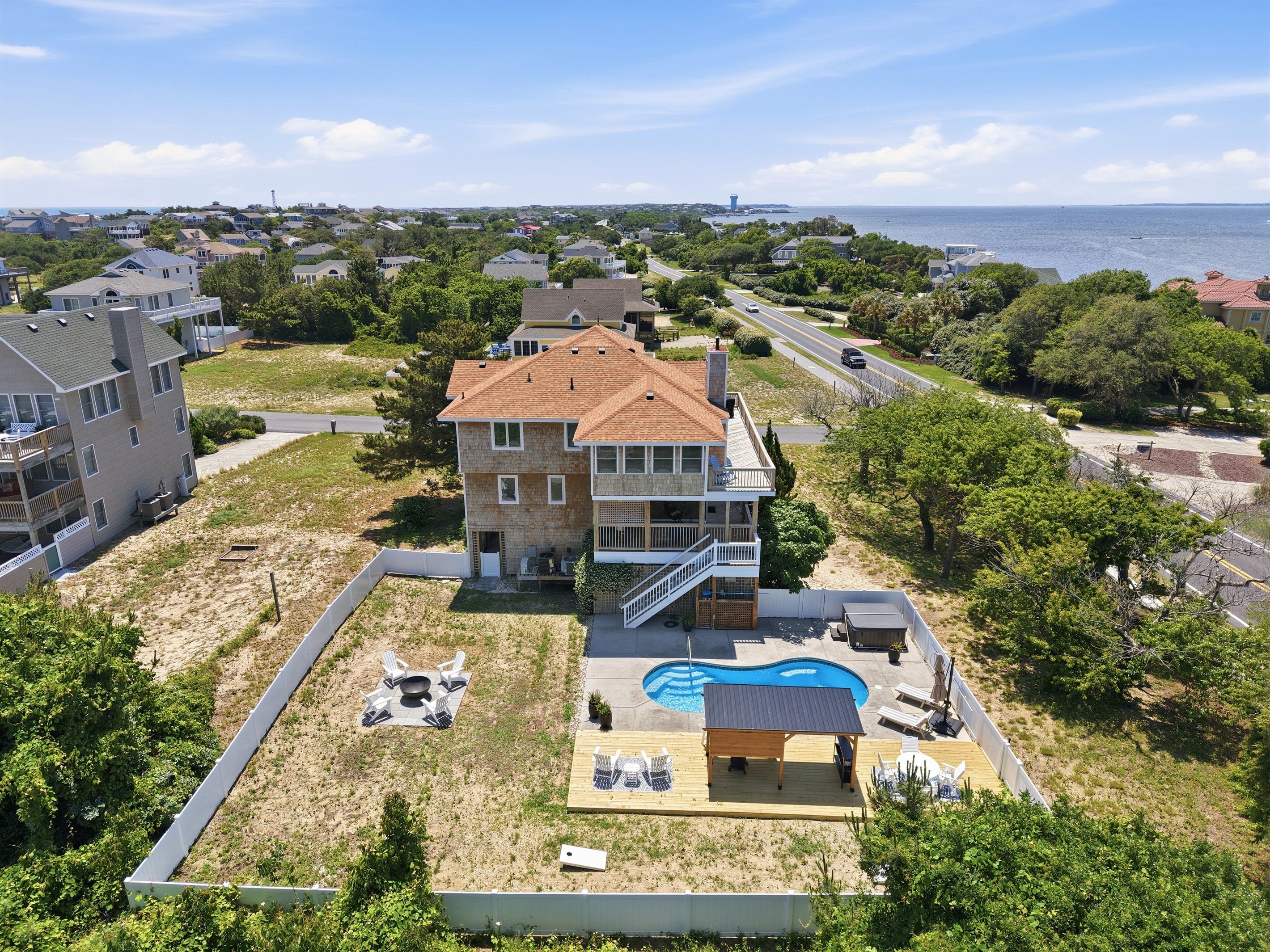 Bird’s-eye view of the property with private pool and outdoor lounge areas