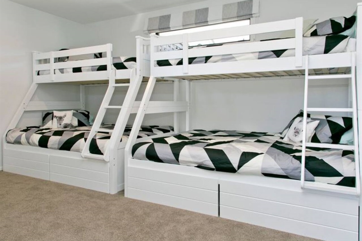 Bunk room , doubles on the bottom and single on the top. There's also a TV on the wall!