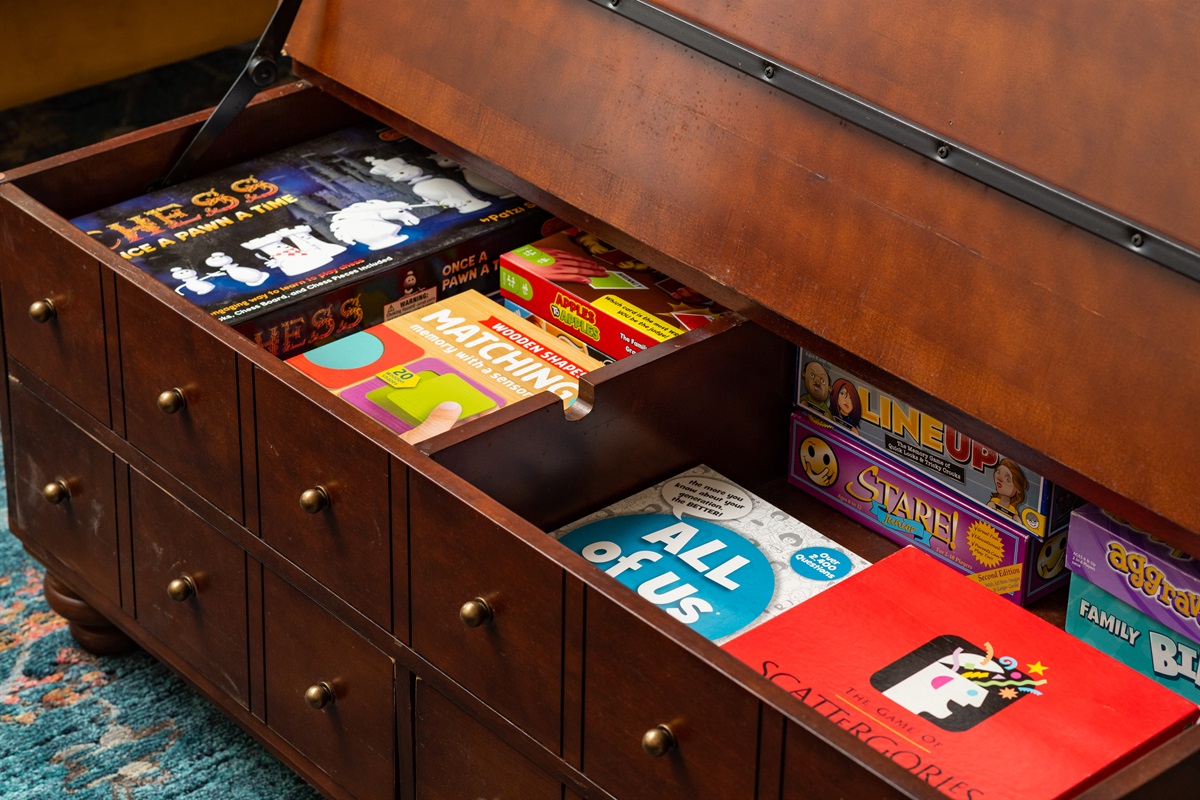 Main Living Space: Coffee table stocked with games for all ages.