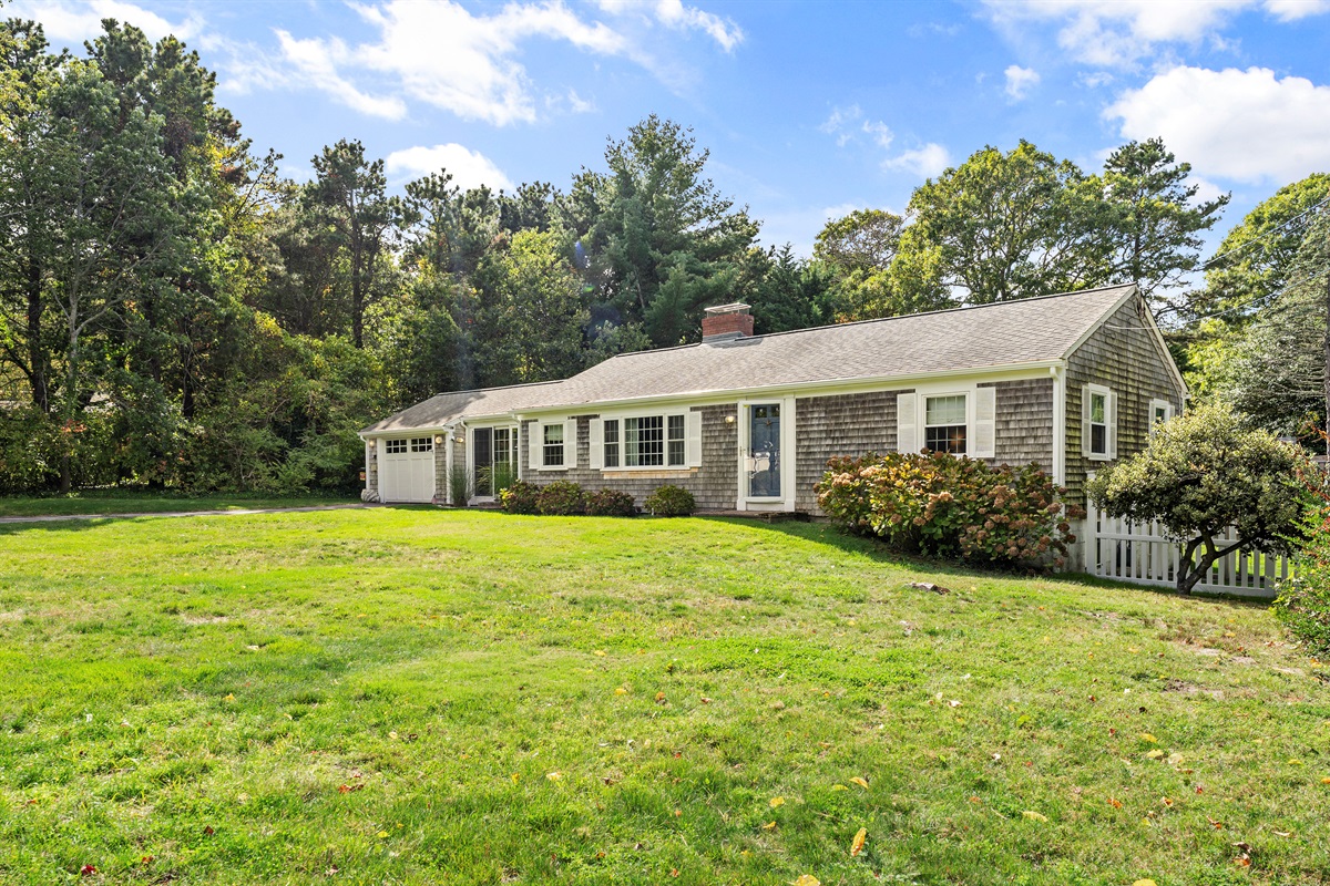 Feel free to use our spacious driveway, but kindly keep the grass clear!