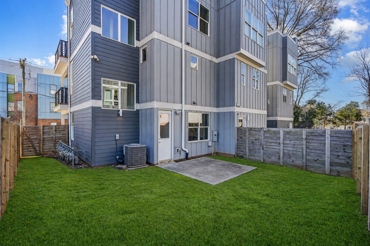 The backyard is fenced in. 