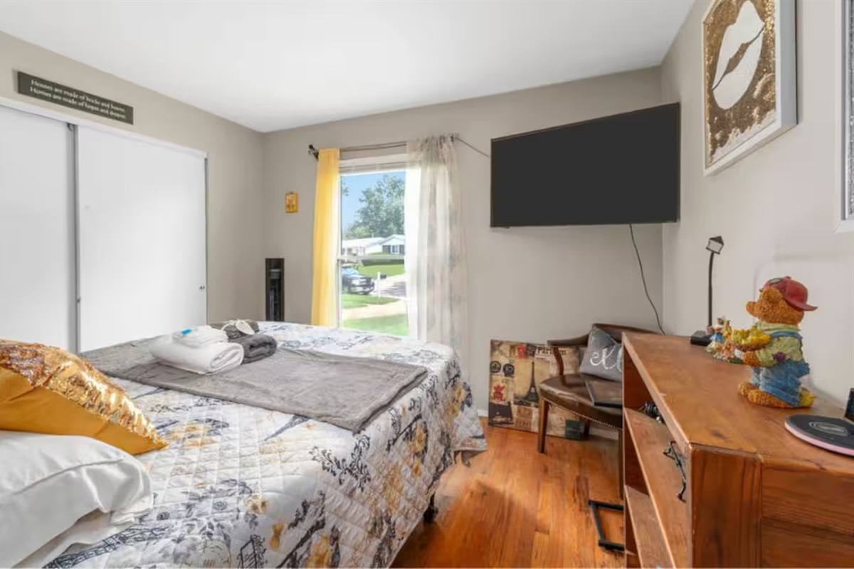 Another view of our second bedroom, showing a space where you can watch TV!