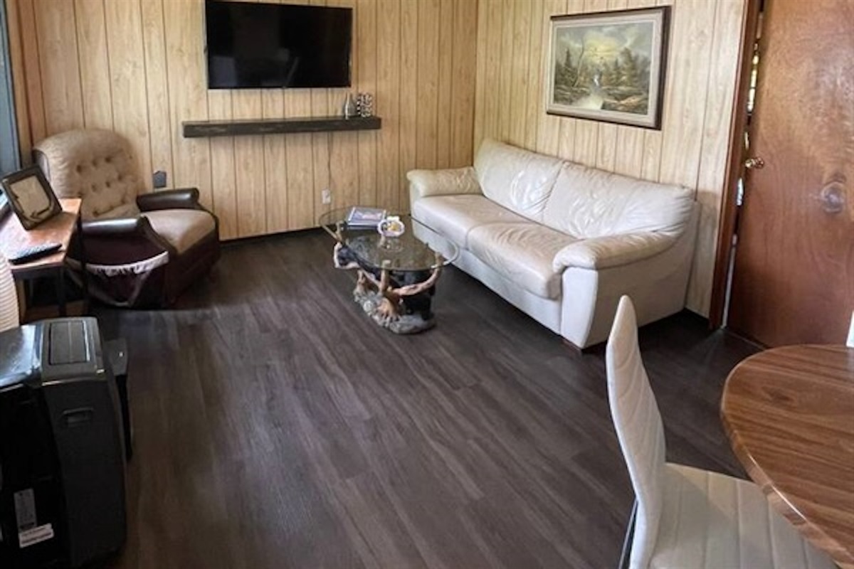 Comfortable living room with sofa and television