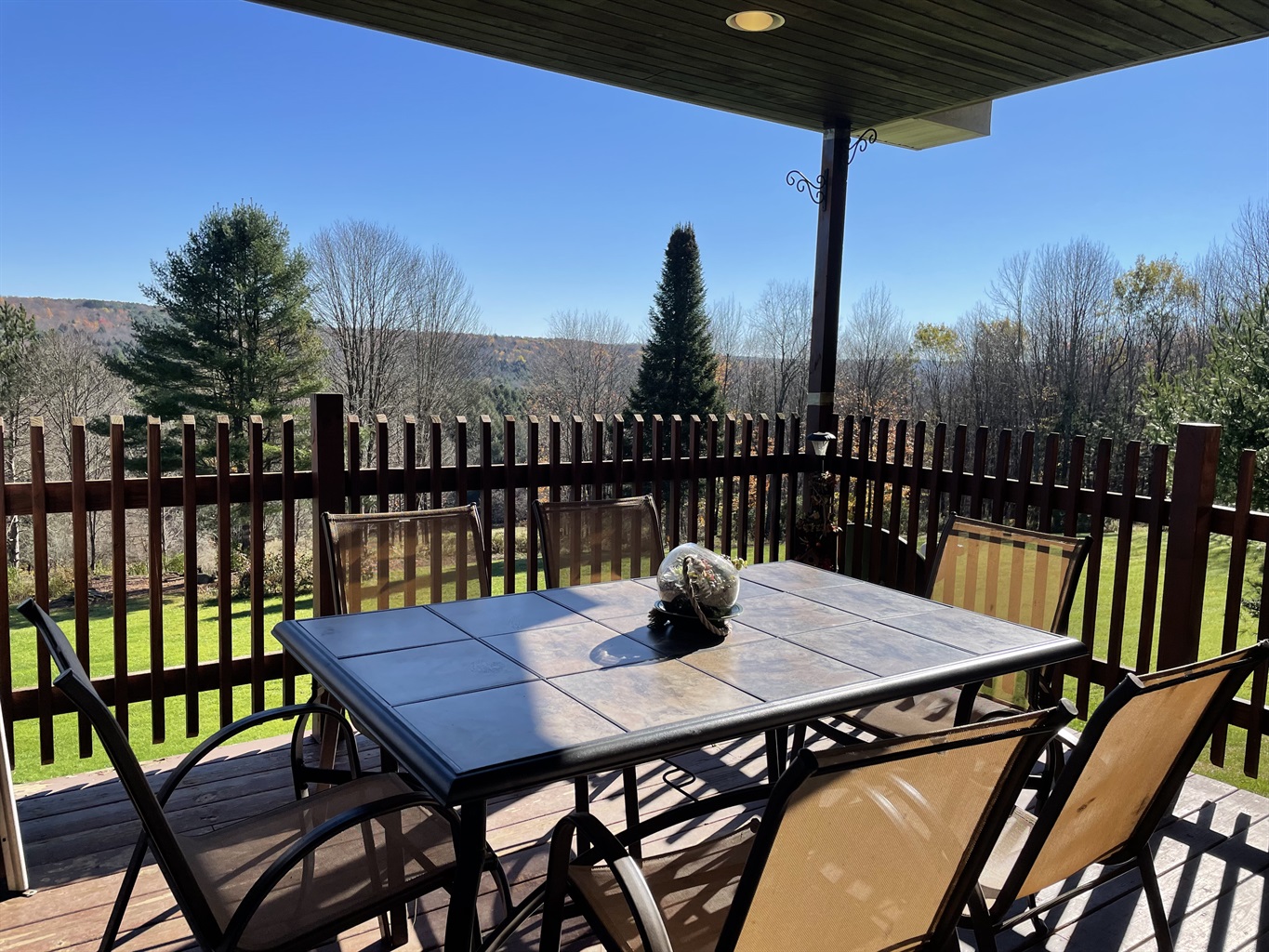 Big Sky outside dining on covered balcony