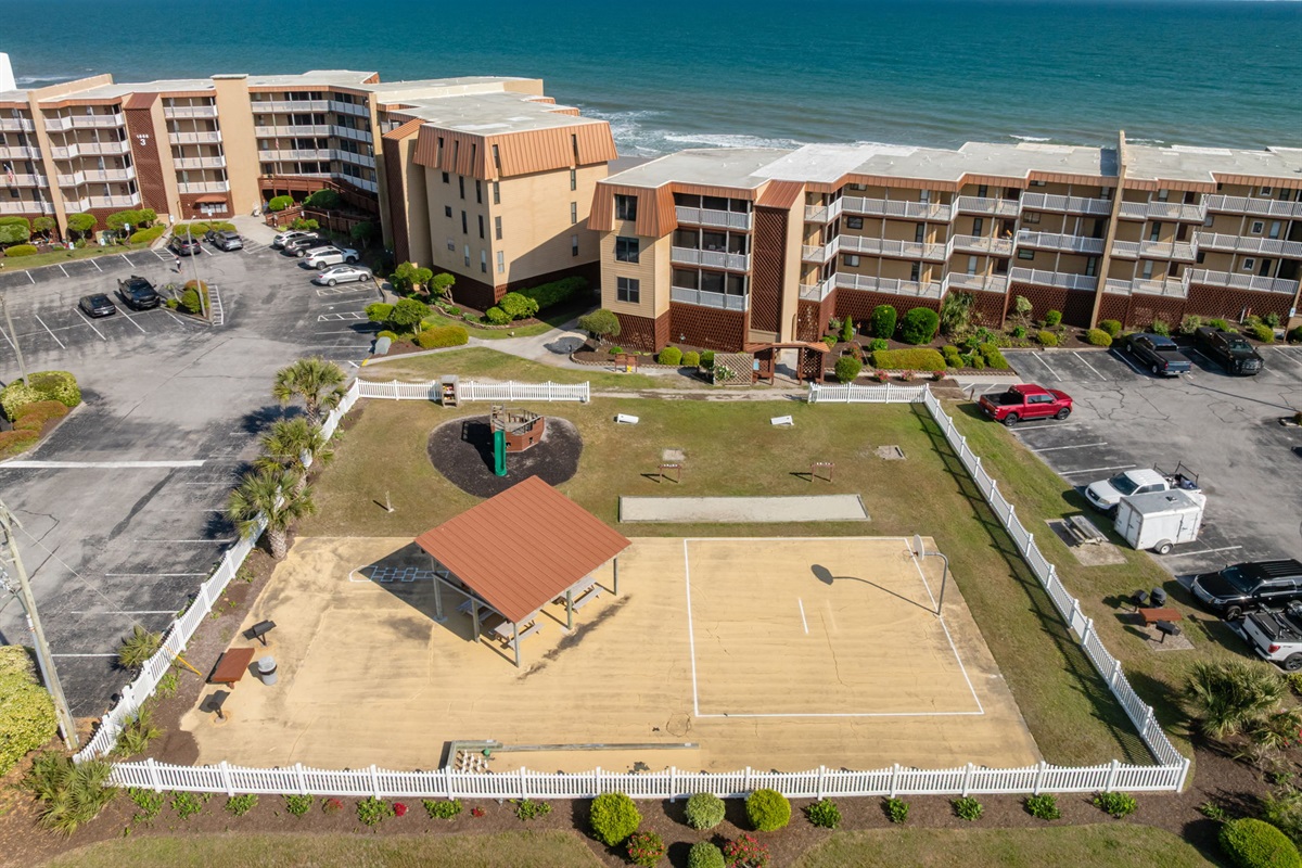 Bird&rsquo;s-eye view of the courtyard and oceanfront buildings, showcasing easy access to every amenity
