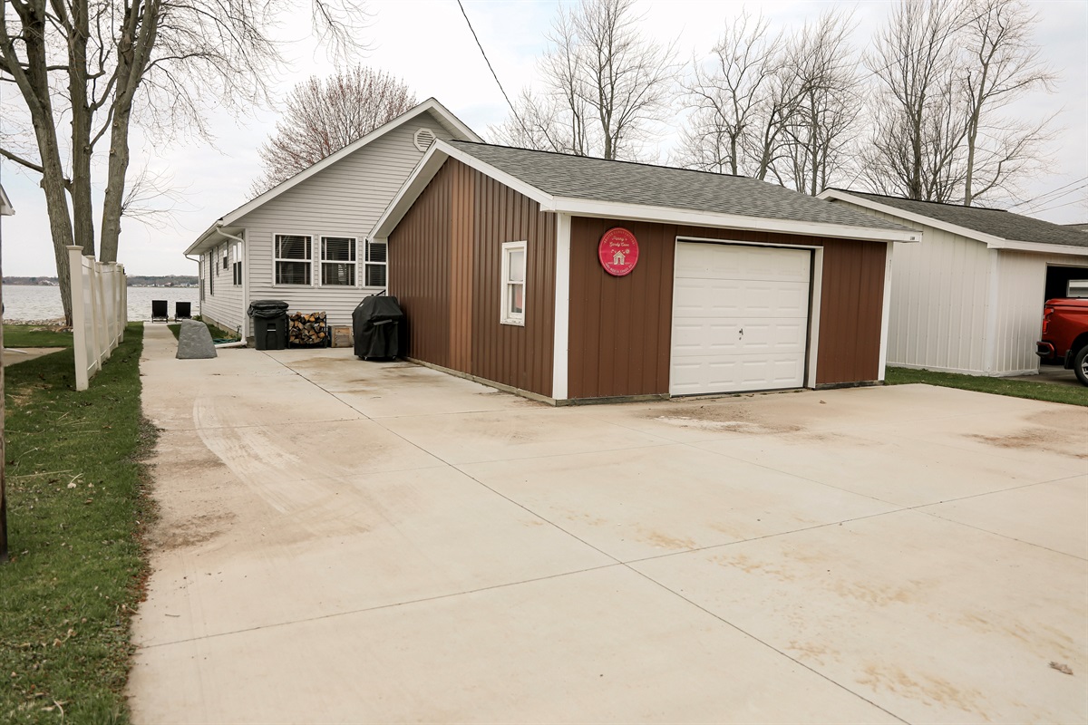 [Concrete Driveway] 4 parking spaces available. The garage is off limits. No parking in the street.
