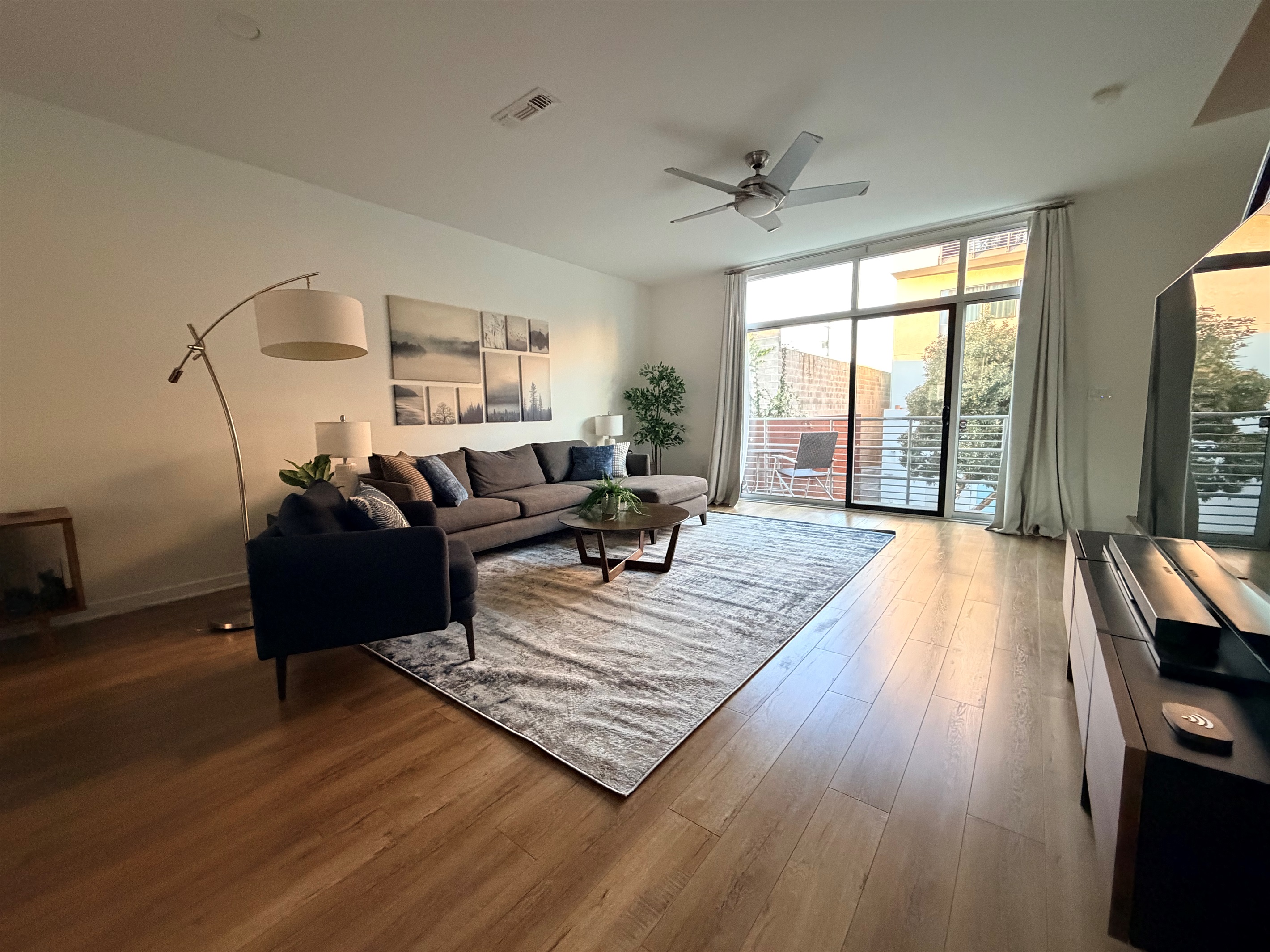 Main living space looking toward the living room and balcony.